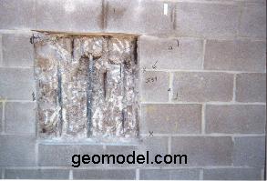 Concrete block wall showing rebar located by GPR during concrete inspection